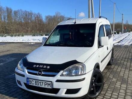 Белый Опель Комбо груз.-пасс., объемом двигателя 1.25 л и пробегом 390 тыс. км за 4350 $, фото 1 на Automoto.ua