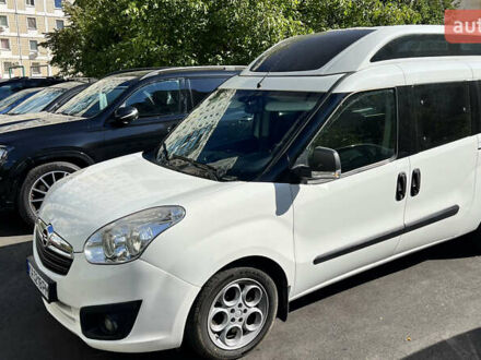 Білий Опель Комбо вант.-пас., об'ємом двигуна 2 л та пробігом 164 тис. км за 15500 $, фото 1 на Automoto.ua