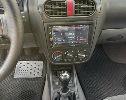 Черный Опель Комбо груз.-пасс., объемом двигателя 2 л и пробегом 334 тыс. км за 3500 $, фото 11 на Automoto.ua