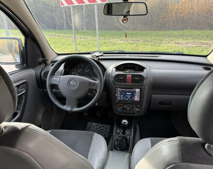 Черный Опель Комбо груз.-пасс., объемом двигателя 2 л и пробегом 334 тыс. км за 3500 $, фото 4 на Automoto.ua