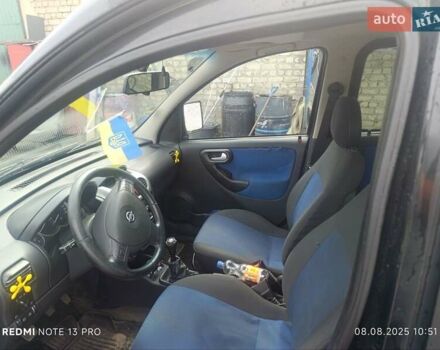 Черный Опель Комбо груз.-пасс., объемом двигателя 1.6 л и пробегом 328 тыс. км за 3300 $, фото 2 на Automoto.ua