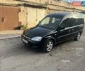 Черный Опель Комбо груз.-пасс., объемом двигателя 1.6 л и пробегом 250 тыс. км за 5000 $, фото 1 на Automoto.ua