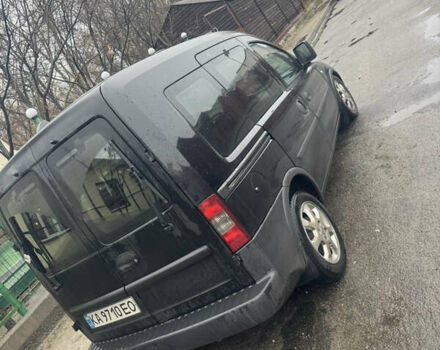 Черный Опель Комбо груз.-пасс., объемом двигателя 1.25 л и пробегом 130 тыс. км за 4200 $, фото 2 на Automoto.ua