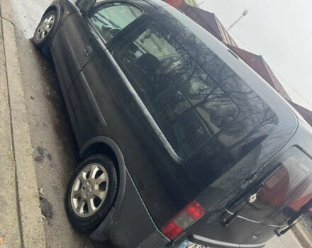 Черный Опель Комбо груз.-пасс., объемом двигателя 1.25 л и пробегом 130 тыс. км за 4200 $, фото 1 на Automoto.ua