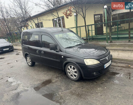 Черный Опель Комбо груз.-пасс., объемом двигателя 1.25 л и пробегом 130 тыс. км за 4200 $, фото 6 на Automoto.ua