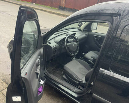 Черный Опель Комбо груз.-пасс., объемом двигателя 1.25 л и пробегом 130 тыс. км за 4200 $, фото 9 на Automoto.ua