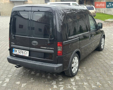 Черный Опель Комбо груз.-пасс., объемом двигателя 1.7 л и пробегом 219 тыс. км за 4999 $, фото 24 на Automoto.ua