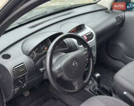 Черный Опель Комбо груз.-пасс., объемом двигателя 1.7 л и пробегом 219 тыс. км за 4999 $, фото 34 на Automoto.ua