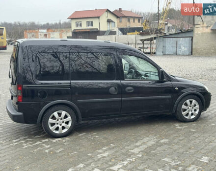 Черный Опель Комбо груз.-пасс., объемом двигателя 1.7 л и пробегом 219 тыс. км за 4999 $, фото 18 на Automoto.ua