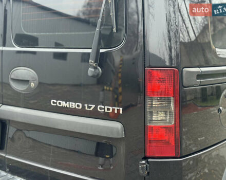 Черный Опель Комбо груз.-пасс., объемом двигателя 1.7 л и пробегом 219 тыс. км за 4999 $, фото 22 на Automoto.ua