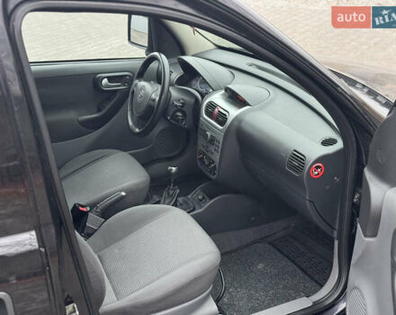 Черный Опель Комбо груз.-пасс., объемом двигателя 1.7 л и пробегом 219 тыс. км за 4999 $, фото 32 на Automoto.ua