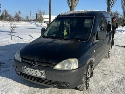 Черный Опель Комбо груз.-пасс., объемом двигателя 1.7 л и пробегом 310 тыс. км за 2950 $, фото 1 на Automoto.ua