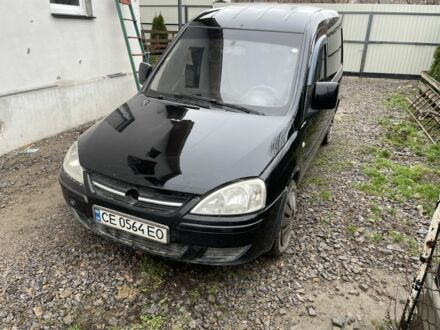 Черный Опель Комбо груз.-пасс., объемом двигателя 1.2 л и пробегом 243 тыс. км за 2500 $, фото 1 на Automoto.ua