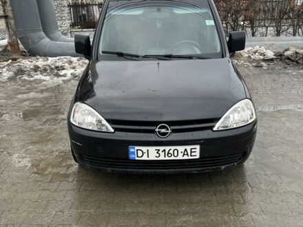 Черный Опель Комбо груз.-пасс., объемом двигателя 1.3 л и пробегом 202 тыс. км за 6000 $, фото 1 на Automoto.ua