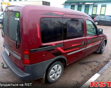 Красный Опель Комбо груз.-пасс., объемом двигателя 1.7 л и пробегом 350 тыс. км за 3000 $, фото 4 на Automoto.ua