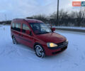 Красный Опель Комбо груз.-пасс., объемом двигателя 1.69 л и пробегом 222 тыс. км за 2900 $, фото 1 на Automoto.ua