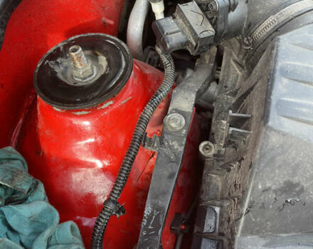 Опель Комбо вант.-пас. 2005 у Остоге на Automoto.ua Червоний Опель Комбо вант.-пас., об'ємом двигуна 1.3 л та пробігом 280 тис. км за 3000 $, фото 14 на Automoto.ua