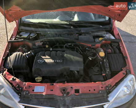 Красный Опель Комбо груз.-пасс., объемом двигателя 1.25 л и пробегом 200 тыс. км за 2650 $, фото 9 на Automoto.ua