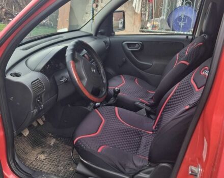 Красный Опель Комбо груз.-пасс., объемом двигателя 1.2 л и пробегом 7 тыс. км за 3000 $, фото 3 на Automoto.ua