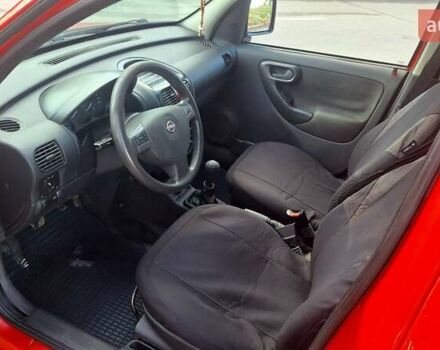 Красный Опель Комбо груз.-пасс., объемом двигателя 1.3 л и пробегом 246 тыс. км за 3699 $, фото 4 на Automoto.ua