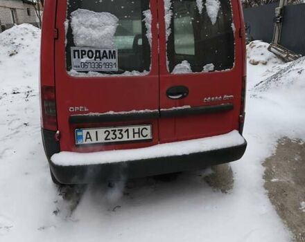 Красный Опель Комбо груз.-пасс., объемом двигателя 1.3 л и пробегом 322 тыс. км за 2600 $, фото 2 на Automoto.ua