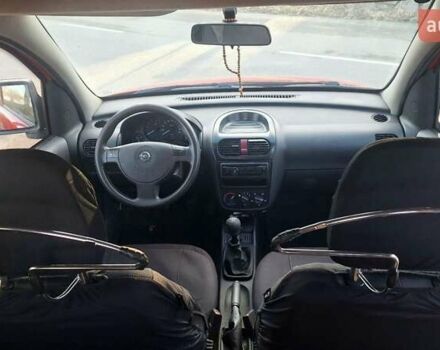 Красный Опель Комбо груз.-пасс., объемом двигателя 1.3 л и пробегом 246 тыс. км за 3699 $, фото 6 на Automoto.ua