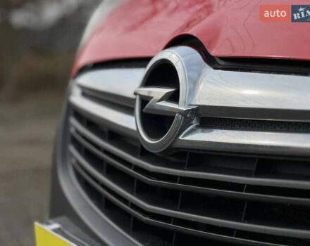 Красный Опель Комбо груз.-пасс., объемом двигателя 1.6 л и пробегом 215 тыс. км за 12890 $, фото 2 на Automoto.ua