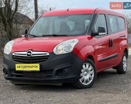 Красный Опель Комбо груз.-пасс., объемом двигателя 1.6 л и пробегом 215 тыс. км за 12890 $, фото 1 на Automoto.ua