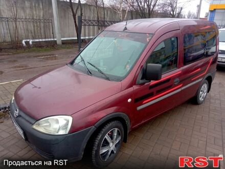 Красный Опель Комбо груз.-пасс., объемом двигателя 1.7 л и пробегом 350 тыс. км за 3000 $, фото 1 на Automoto.ua
