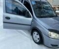 Серый Опель Комбо груз.-пасс., объемом двигателя 1.3 л и пробегом 240 тыс. км за 4800 $, фото 1 на Automoto.ua