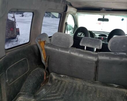 Серый Опель Комбо груз.-пасс., объемом двигателя 1.3 л и пробегом 200 тыс. км за 2800 $, фото 4 на Automoto.ua