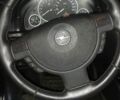 Синий Опель Комбо груз.-пасс., объемом двигателя 1.4 л и пробегом 250 тыс. км за 5816 $, фото 4 на Automoto.ua