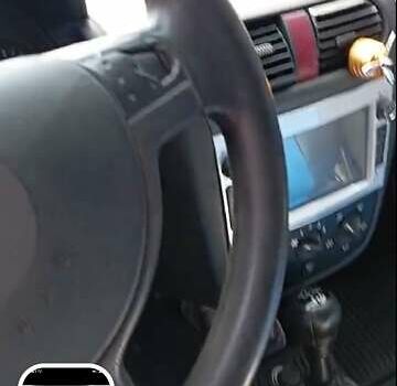 Синий Опель Комбо груз.-пасс., объемом двигателя 1.7 л и пробегом 327 тыс. км за 2800 $, фото 2 на Automoto.ua