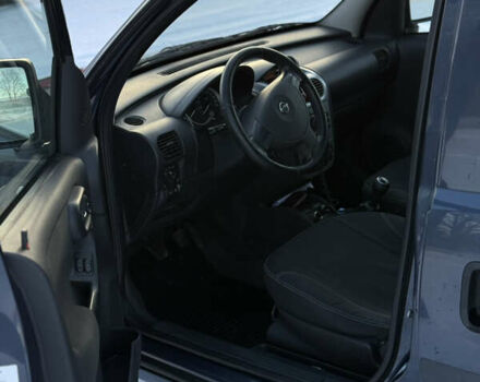 Синий Опель Комбо груз.-пасс., объемом двигателя 1.25 л и пробегом 273 тыс. км за 5200 $, фото 14 на Automoto.ua