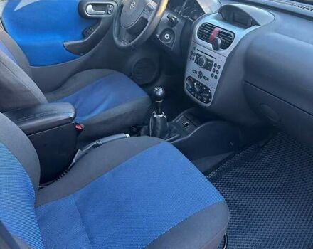 Синий Опель Комбо груз.-пасс., объемом двигателя 1.25 л и пробегом 245 тыс. км за 4450 $, фото 13 на Automoto.ua