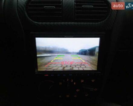 Синий Опель Комбо груз.-пасс., объемом двигателя 1.7 л и пробегом 190 тыс. км за 6000 $, фото 7 на Automoto.ua