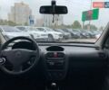 Синий Опель Комбо груз.-пасс., объемом двигателя 1.2 л и пробегом 326 тыс. км за 3990 $, фото 11 на Automoto.ua