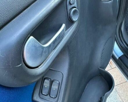 Синий Опель Комбо груз.-пасс., объемом двигателя 1.25 л и пробегом 245 тыс. км за 4450 $, фото 17 на Automoto.ua