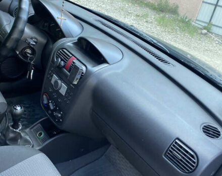 Синий Опель Комбо груз.-пасс., объемом двигателя 1.3 л и пробегом 295 тыс. км за 5100 $, фото 29 на Automoto.ua