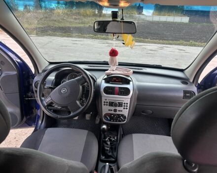 Синий Опель Комбо груз.-пасс., объемом двигателя 1.6 л и пробегом 265 тыс. км за 4000 $, фото 3 на Automoto.ua