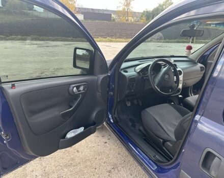 Синий Опель Комбо груз.-пасс., объемом двигателя 1.6 л и пробегом 265 тыс. км за 4000 $, фото 5 на Automoto.ua