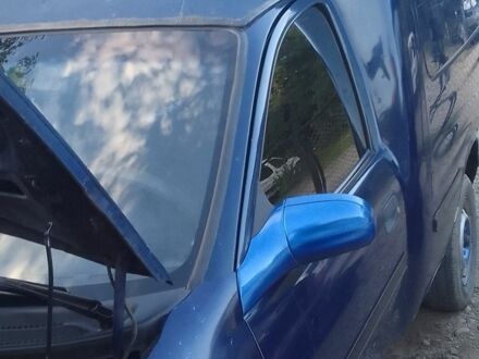 Синий Опель Комбо груз.-пасс., объемом двигателя 1 л и пробегом 1 тыс. км за 1300 $, фото 1 на Automoto.ua