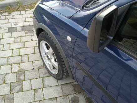 Синий Опель Комбо груз.-пасс., объемом двигателя 1.2 л и пробегом 260 тыс. км за 4600 $, фото 1 на Automoto.ua