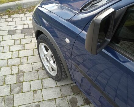 Синий Опель Комбо груз.-пасс., объемом двигателя 1.2 л и пробегом 260 тыс. км за 4600 $, фото 1 на Automoto.ua