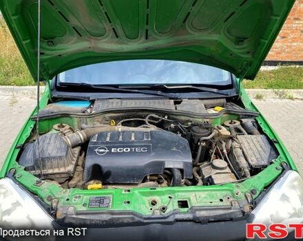 Зеленый Опель Комбо груз.-пасс., объемом двигателя 1.2 л и пробегом 255 тыс. км за 4500 $, фото 4 на Automoto.ua