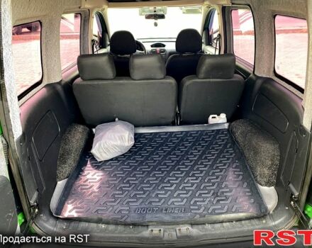 Зеленый Опель Комбо груз.-пасс., объемом двигателя 1.2 л и пробегом 255 тыс. км за 4500 $, фото 5 на Automoto.ua