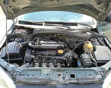 Зеленый Опель Комбо груз.-пасс., объемом двигателя 1.6 л и пробегом 368 тыс. км за 2600 $, фото 4 на Automoto.ua