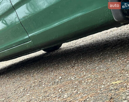 Зеленый Опель Комбо груз.-пасс., объемом двигателя 1.3 л и пробегом 300 тыс. км за 3450 $, фото 14 на Automoto.ua