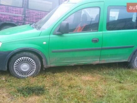 Зеленый Опель Комбо груз.-пасс., объемом двигателя 1.2 л и пробегом 325 тыс. км за 1800 $, фото 1 на Automoto.ua