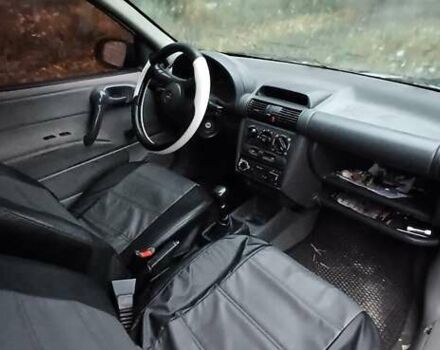 Белый Опель Корса, объемом двигателя 1.2 л и пробегом 450 тыс. км за 1179 $, фото 2 на Automoto.ua